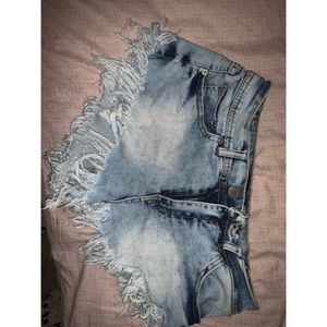 Ripped booty jean shorts